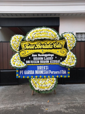Papan Bunga Duka di Merek