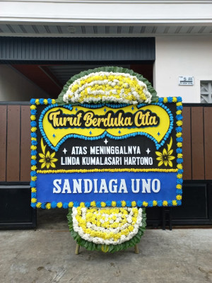 Papan Bunga Duka di Merek